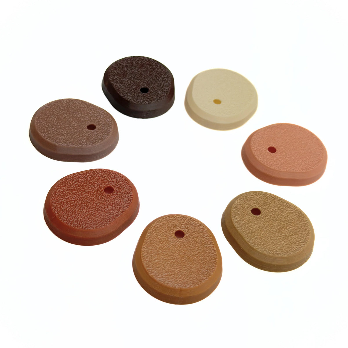 Sept coques myDiscreto pour capteur Dexcom G7, disposées en cercle dans les sept couleurs disponibles