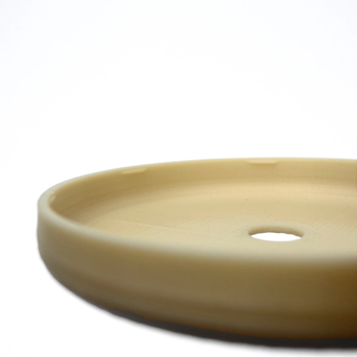 Coque beige clair pour capteur FreeStyle Libre 2, vue macro du dessous
