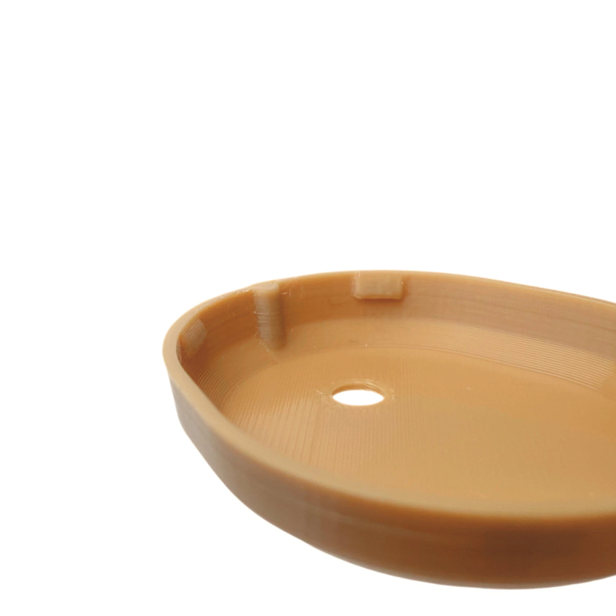 Coque beige foncé pour capteur Dexcom G7, vue macro du dessous