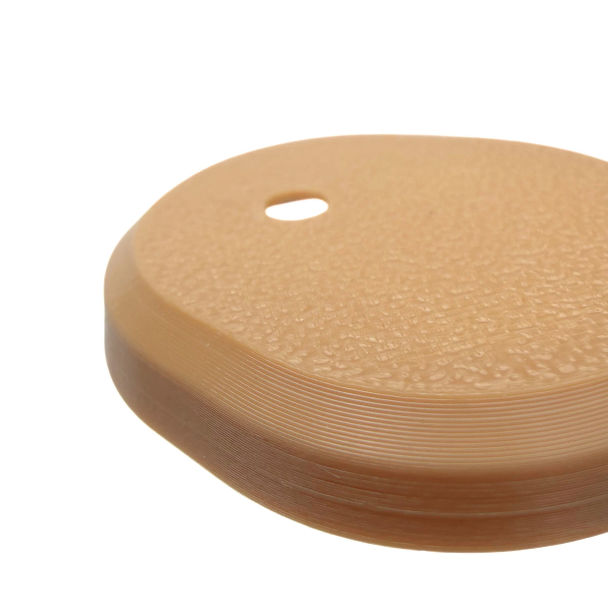 Coque beige foncé pour capteur Dexcom G7, vue macro du dessus
