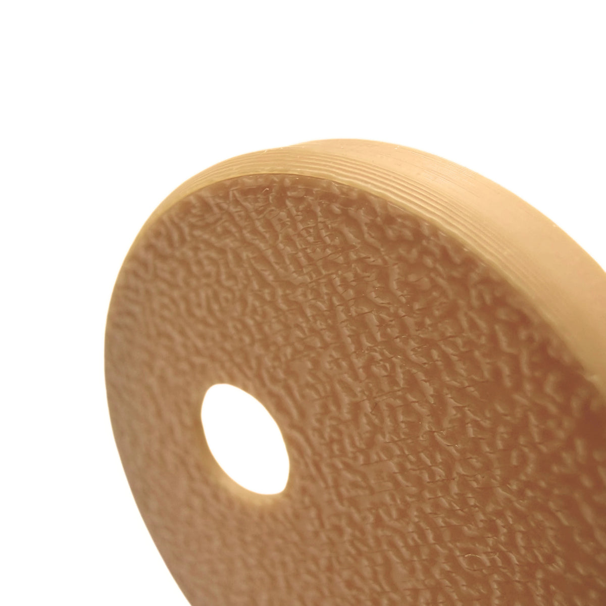 Coque beige foncé pour capteur FreeStyle Libre 3, vue macro du dessus