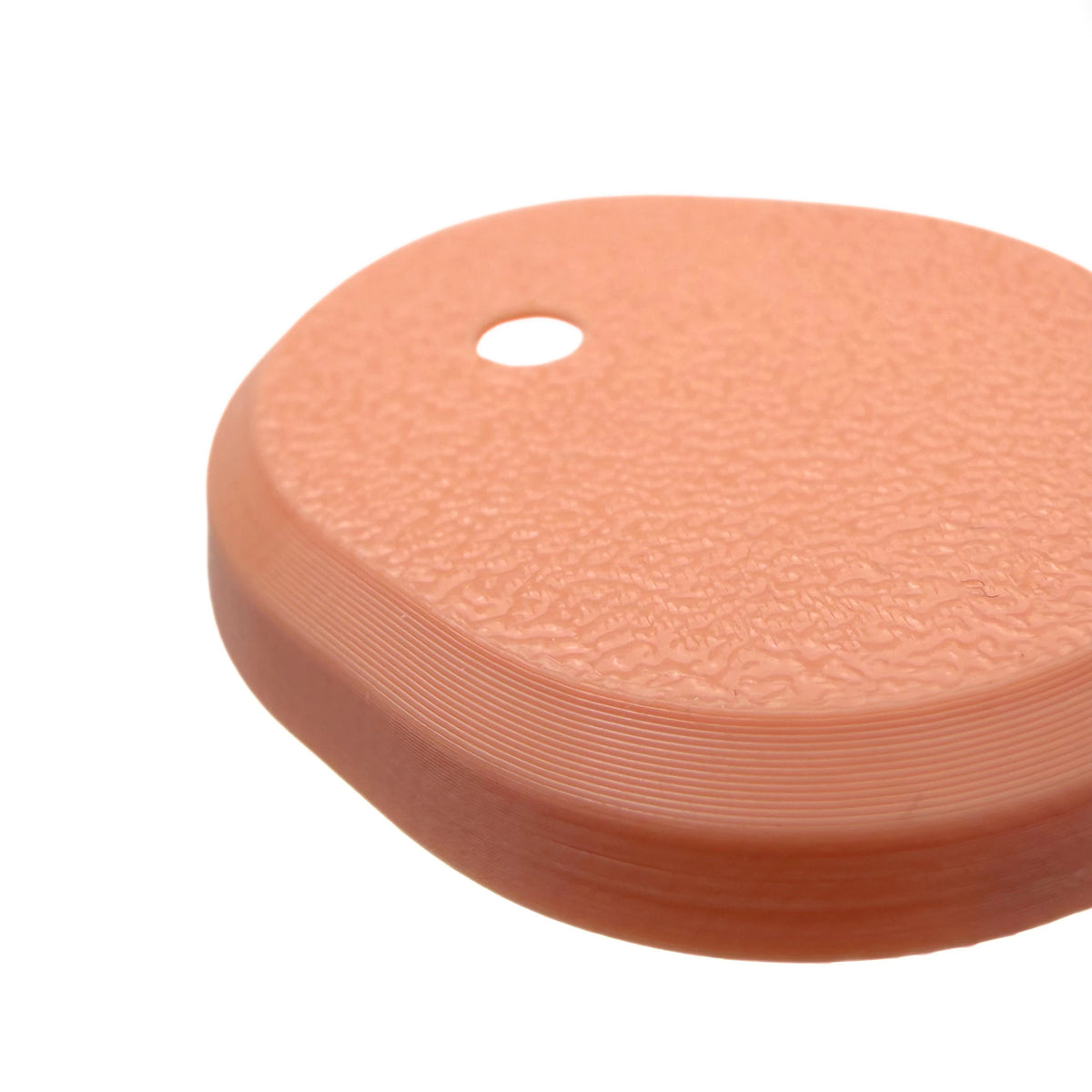 Coque beige rosé pour capteur Dexcom G7, vue macro du dessus