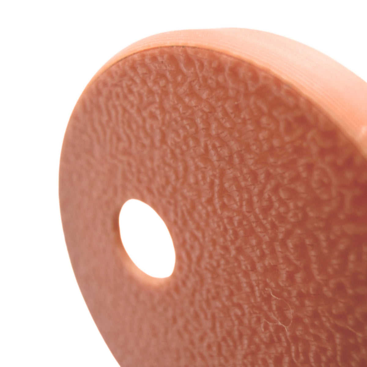 Coque beige rosé pour capteur FreeStyle Libre 3, vue macro du dessus