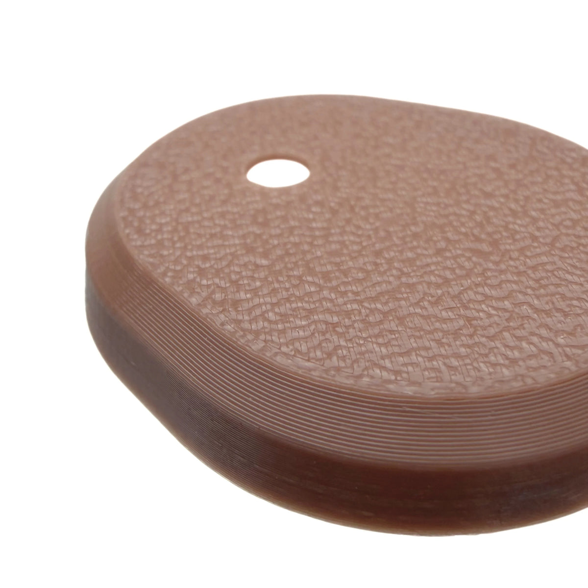 Coque marron foncé pour capteur Dexcom G7, vue macro du dessus