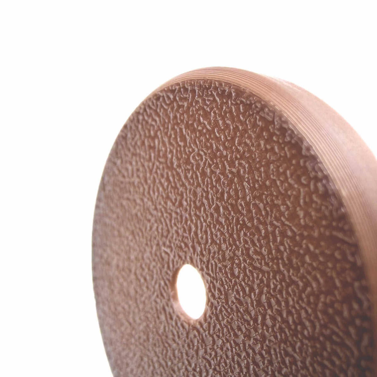 Coque marron foncé pour capteur FreeStyle Libre 2, vue macro du dessus